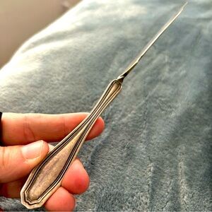 Wm A. Rogers Twisted Handle Butter Knife